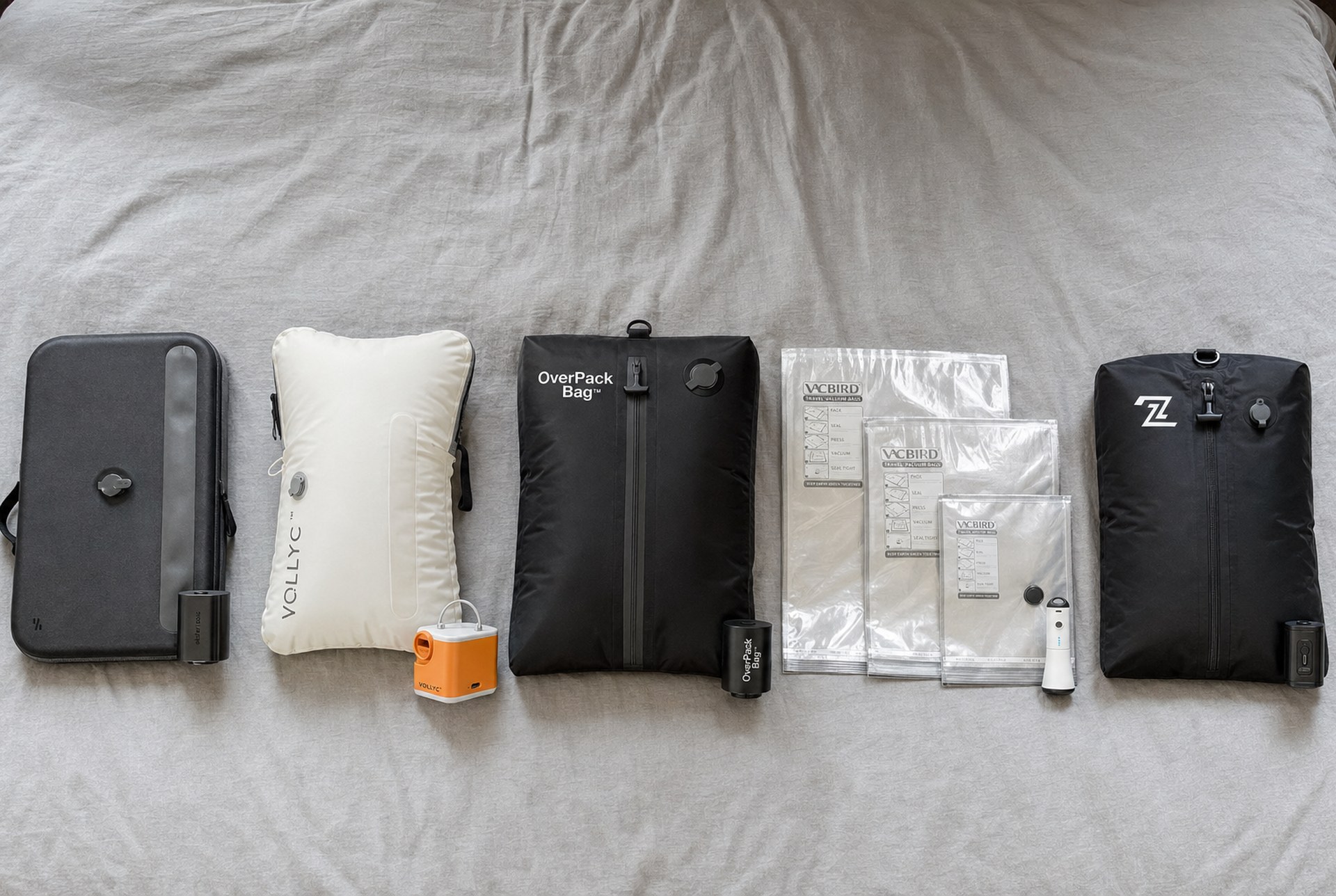 Five vacuum packing kits side by side: Ekster, Vollyc, OverPack, Vacbird and 2PackBag